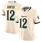J.Jaguars #12 Travis Hunter Player Natural Limited 2026 Rivalries Collection Game Gdoa Stitched Jerseys